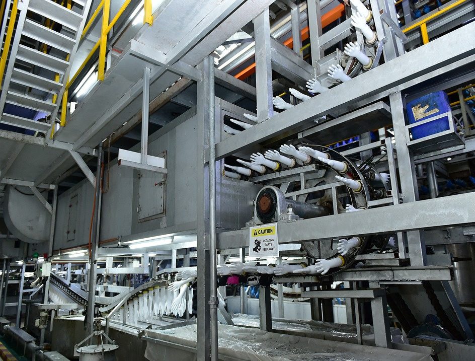 Stainless steel glove dipping production line fabricated and installed by Premium Health Care